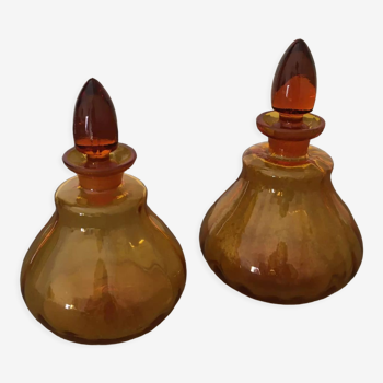 Duo of amber glass toilet bottles with glass stopper