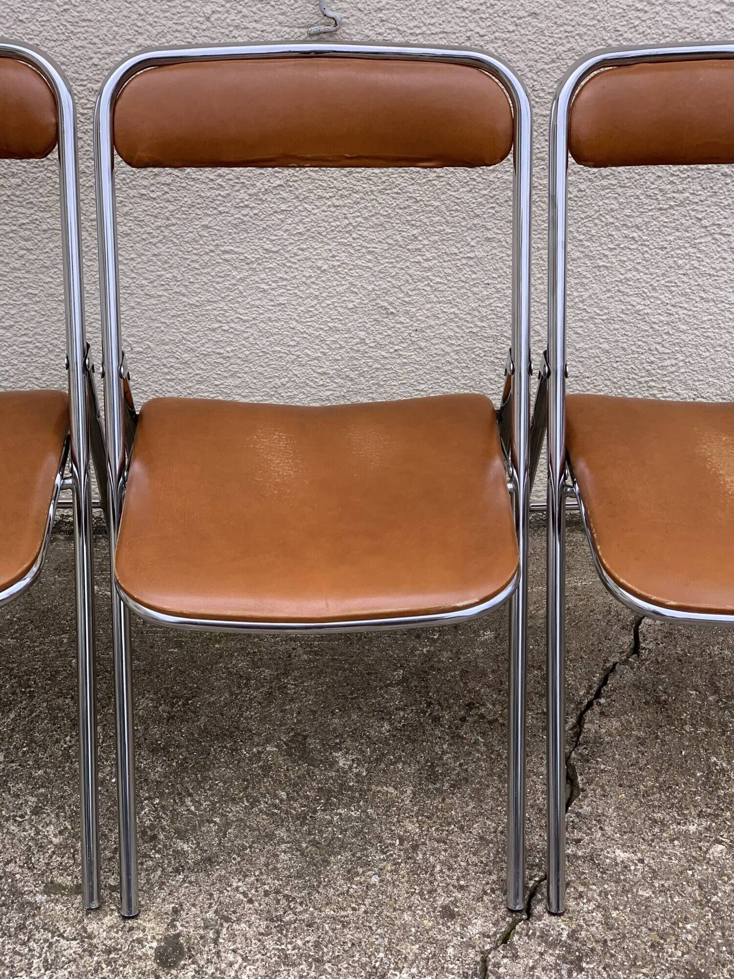 4 folding chairs chromed metal and Skaï fawn 1970