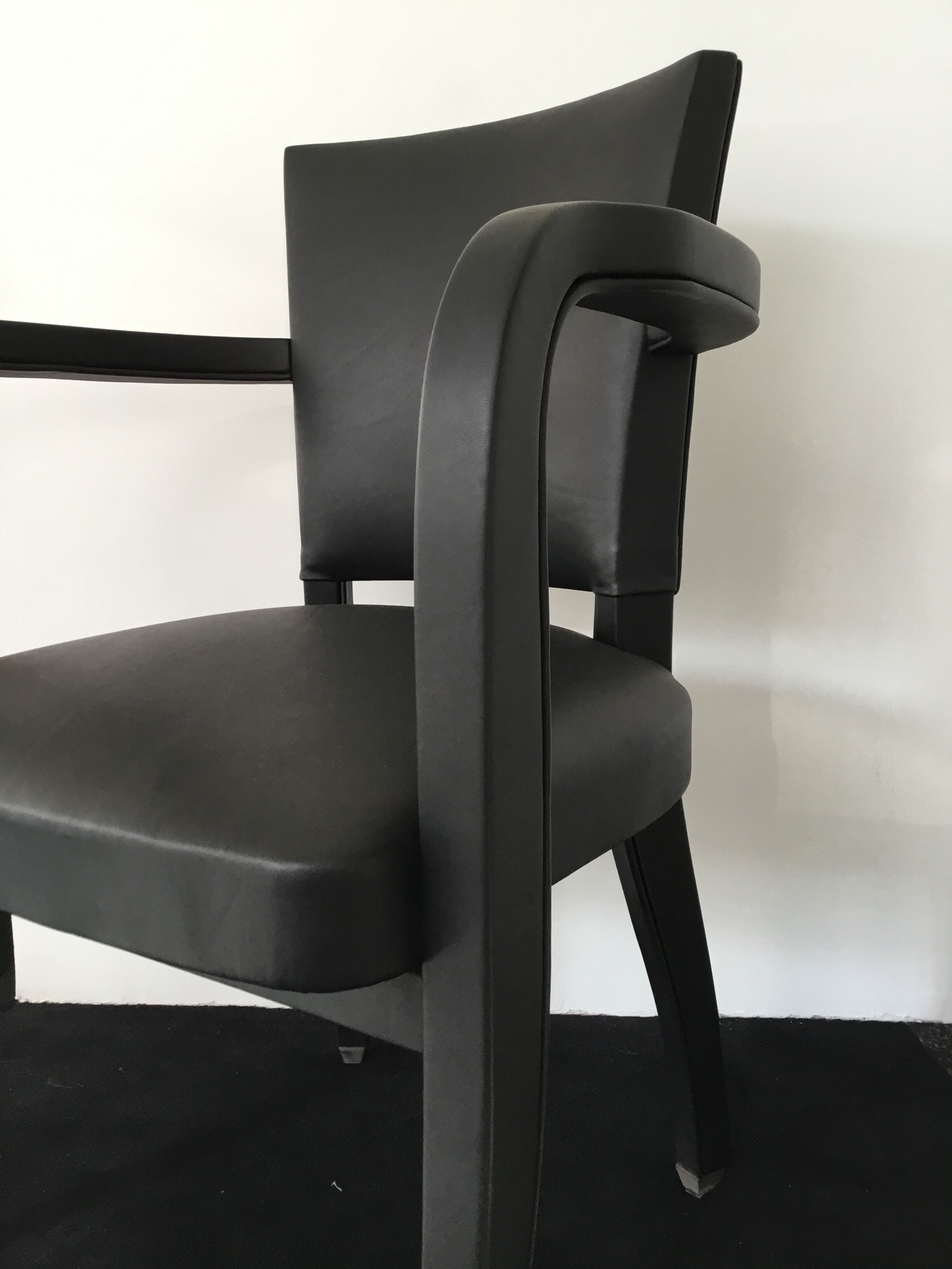 Leather-wrapped black bridge chair