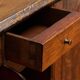 Antique English oak secretary with drop-down front.