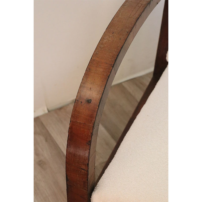 Pair of modernist armchairs in wood and buckle fabric, 1940