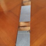 Round cherry wood table with extensions
