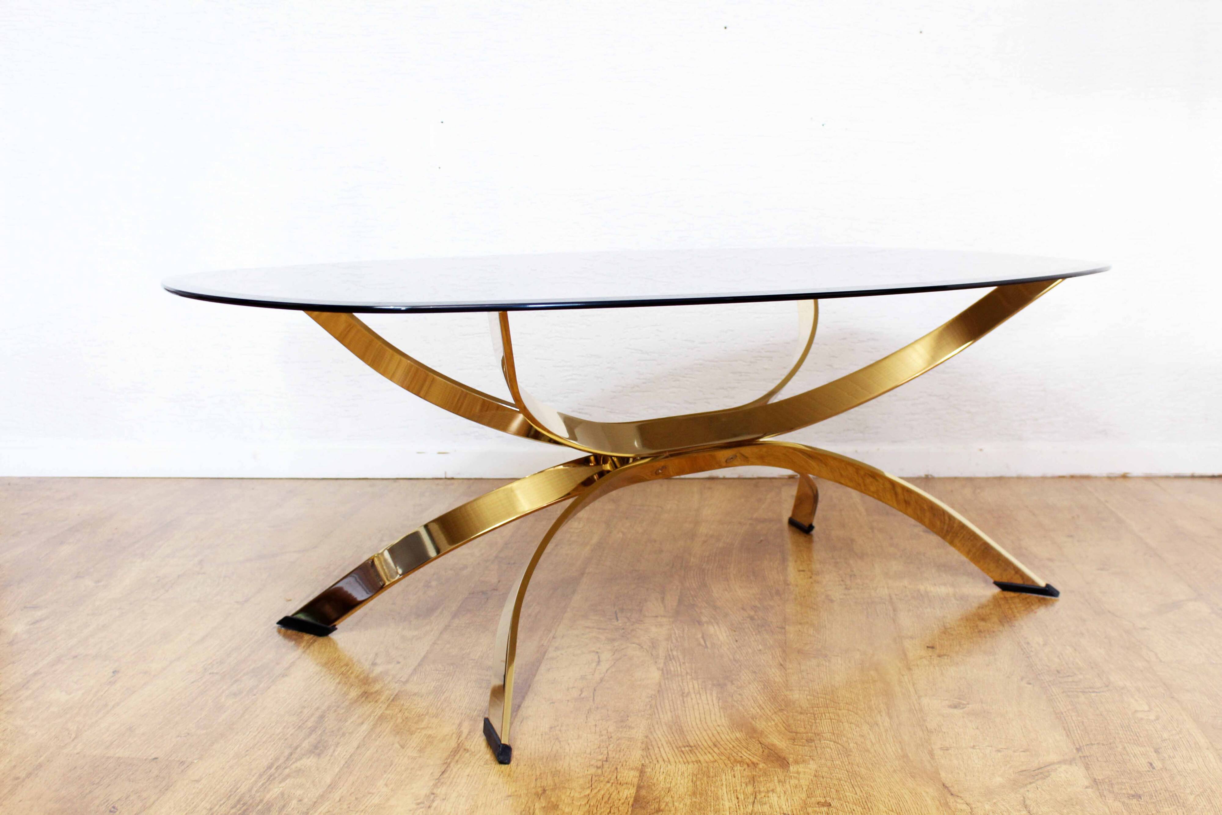 Italian coffee table in smoked glass and brass