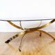 Italian coffee table in smoked glass and brass