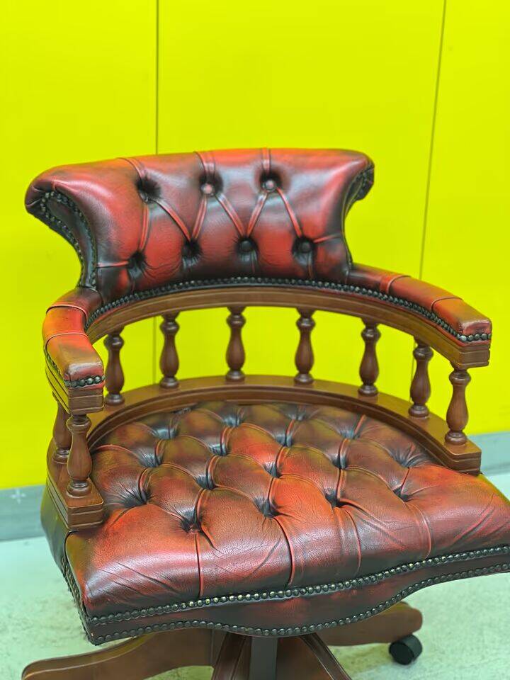 Chesterfield Revolving Captain's Chair with Red Leather Upholstery