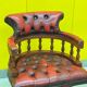 Chesterfield Revolving Captain's Chair with Red Leather Upholstery