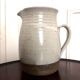Enamelled sandstone jug signed vintage