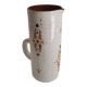 Old glazed terracotta carafe with signature