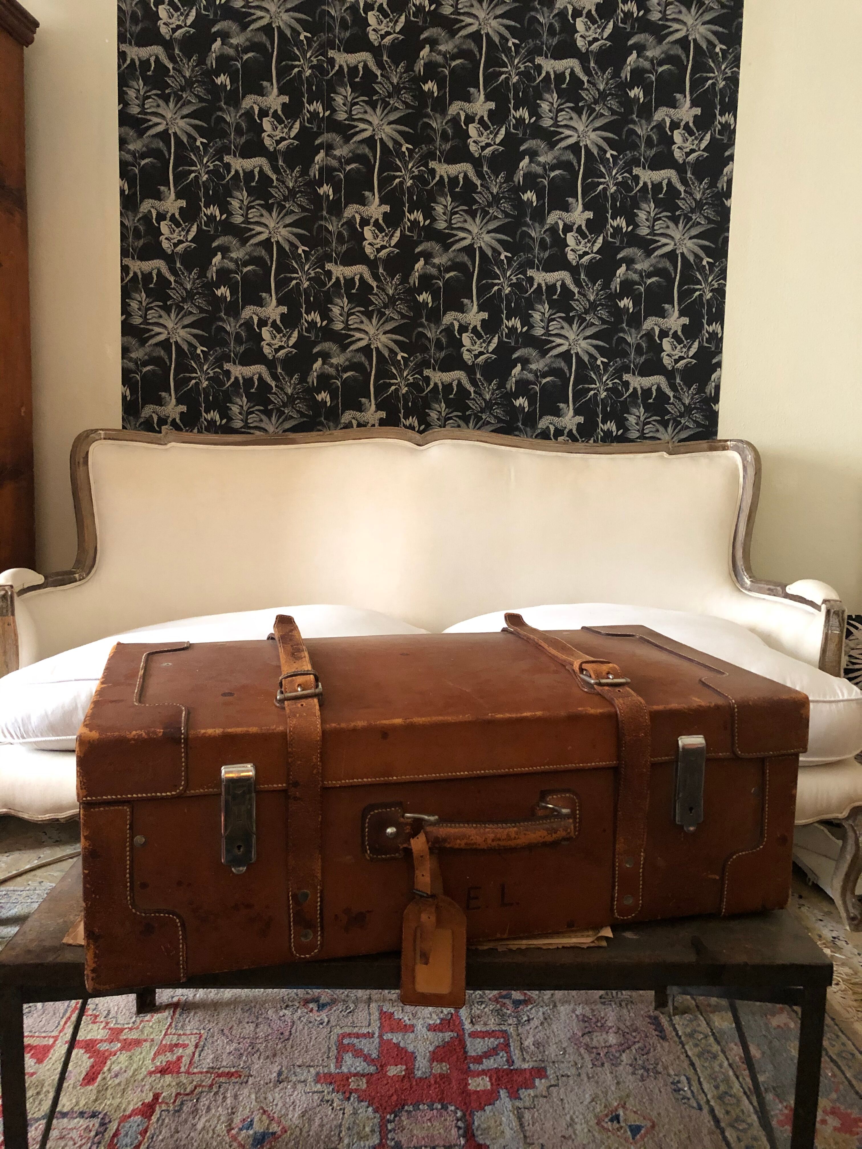 Former leather trunk with Louis Vuitton label holder