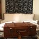 Former leather trunk with Louis Vuitton label holder