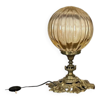 Bronze lamp and amber globe circa 1900