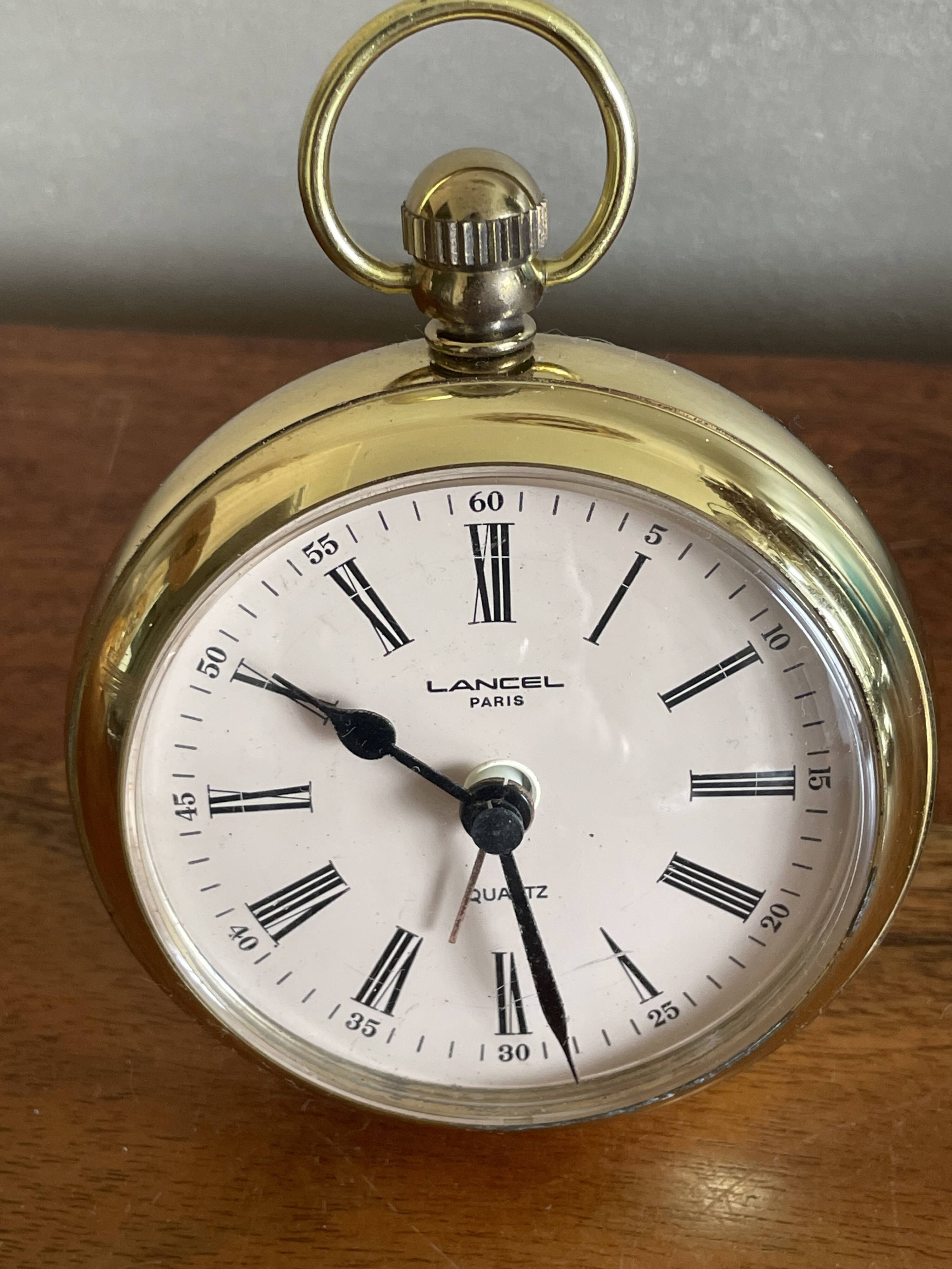 Lancel alarm clock pocket shape