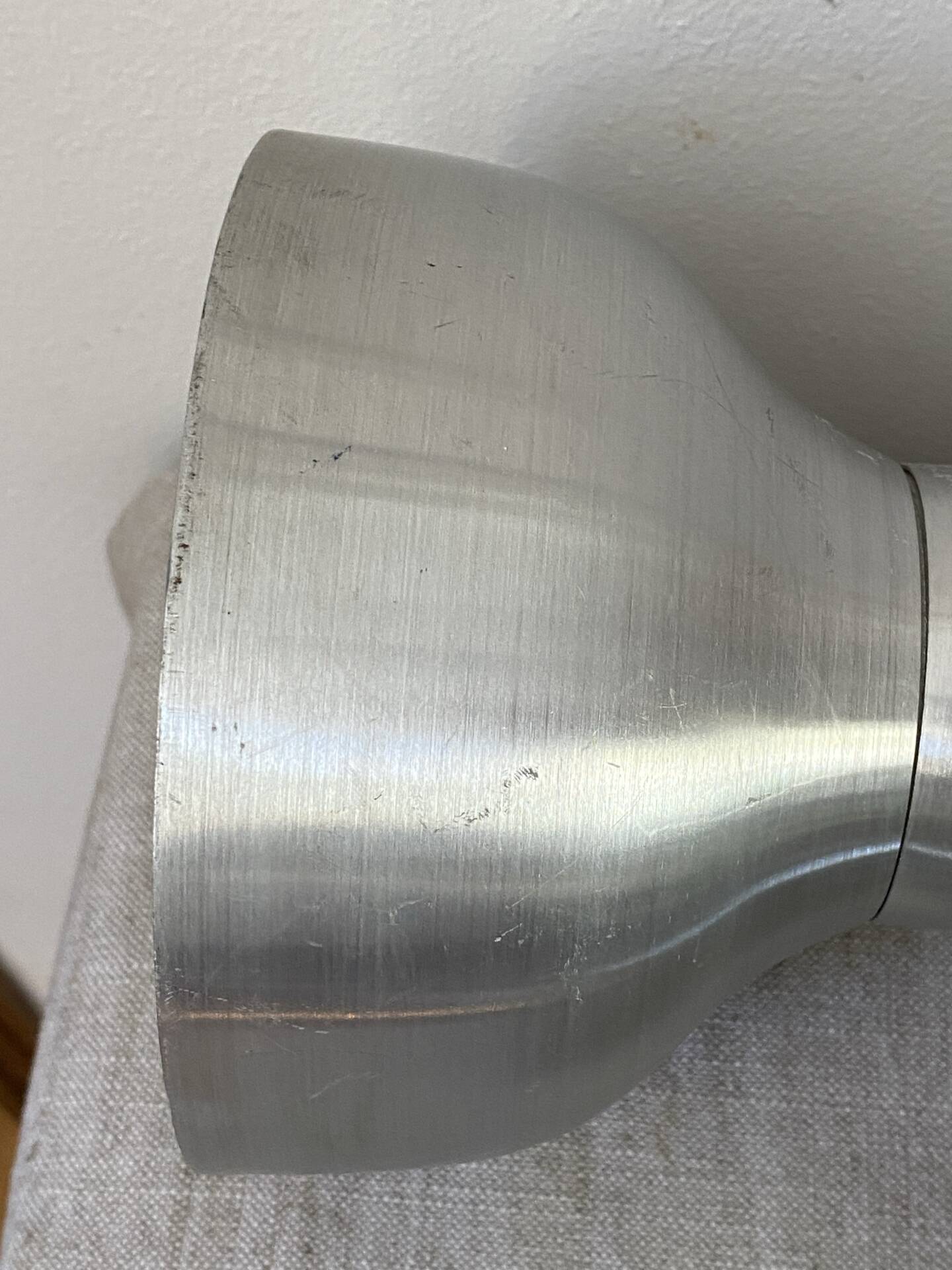 Pair of brushed metal wall sconces