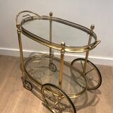 Oval brass trolley from Maison Baguès.