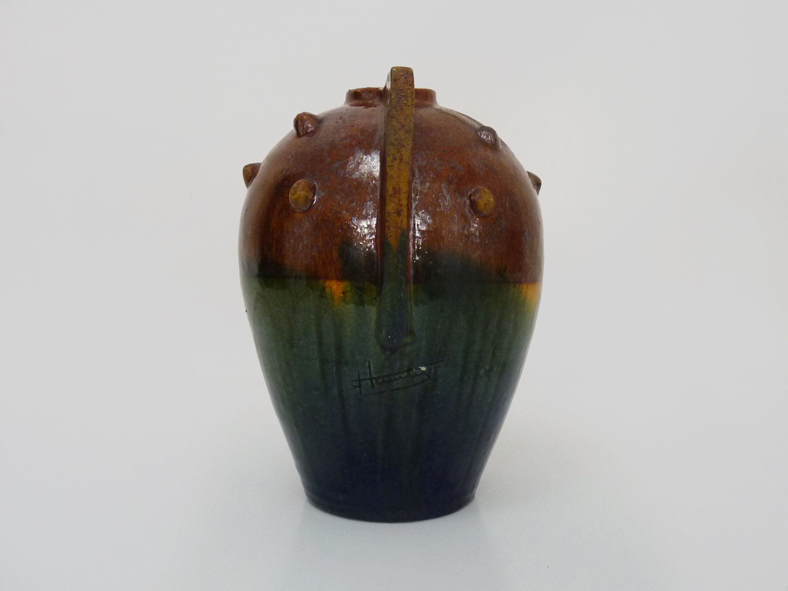 Vase in flamed stoneware with Rambervillers style ear. Signed