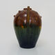 Vase in flamed stoneware with Rambervillers style ear. Signed