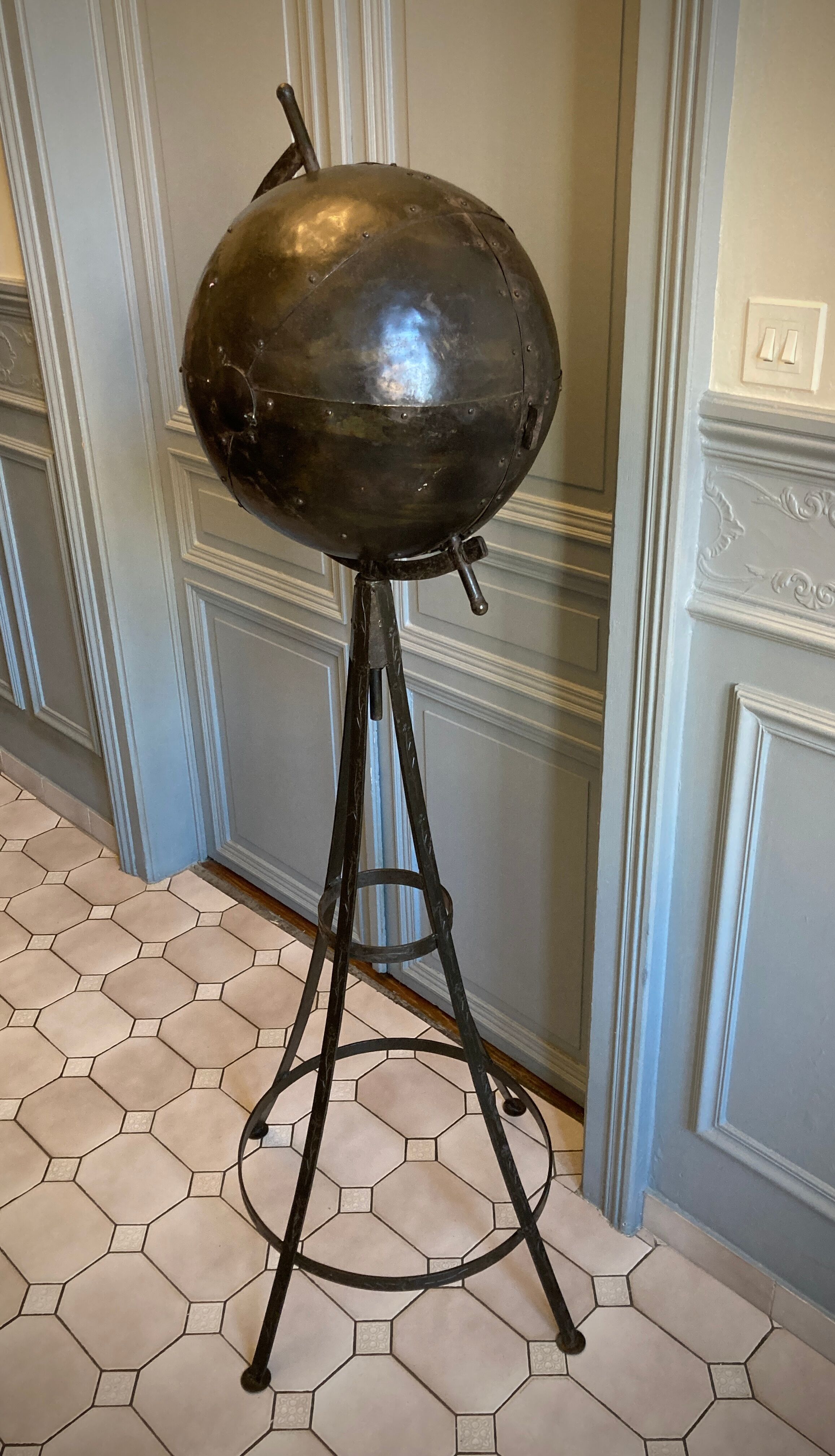 Atypical industrial furniture riveted sphere