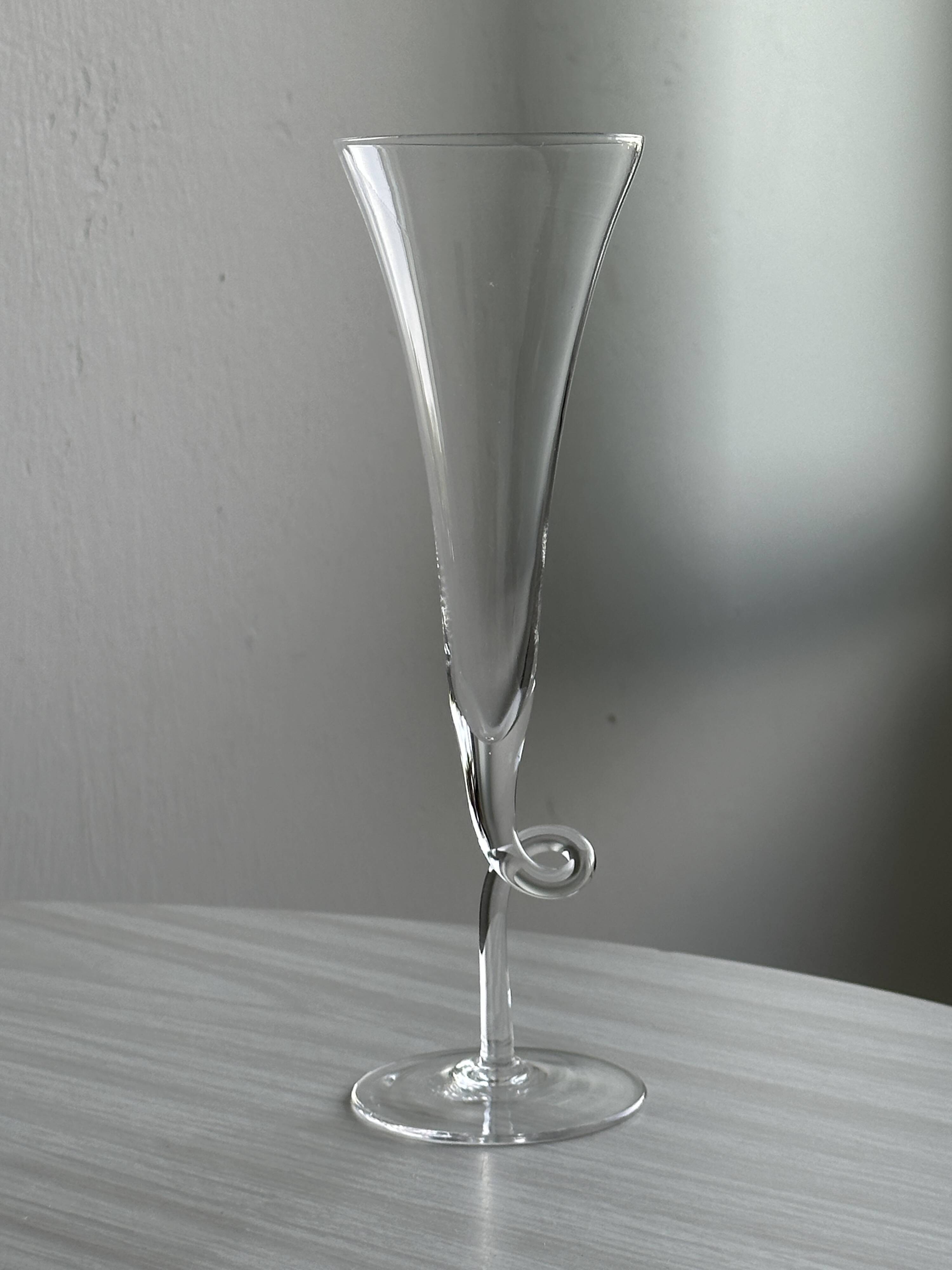 4 blown glass champagne flutes with twisted stem