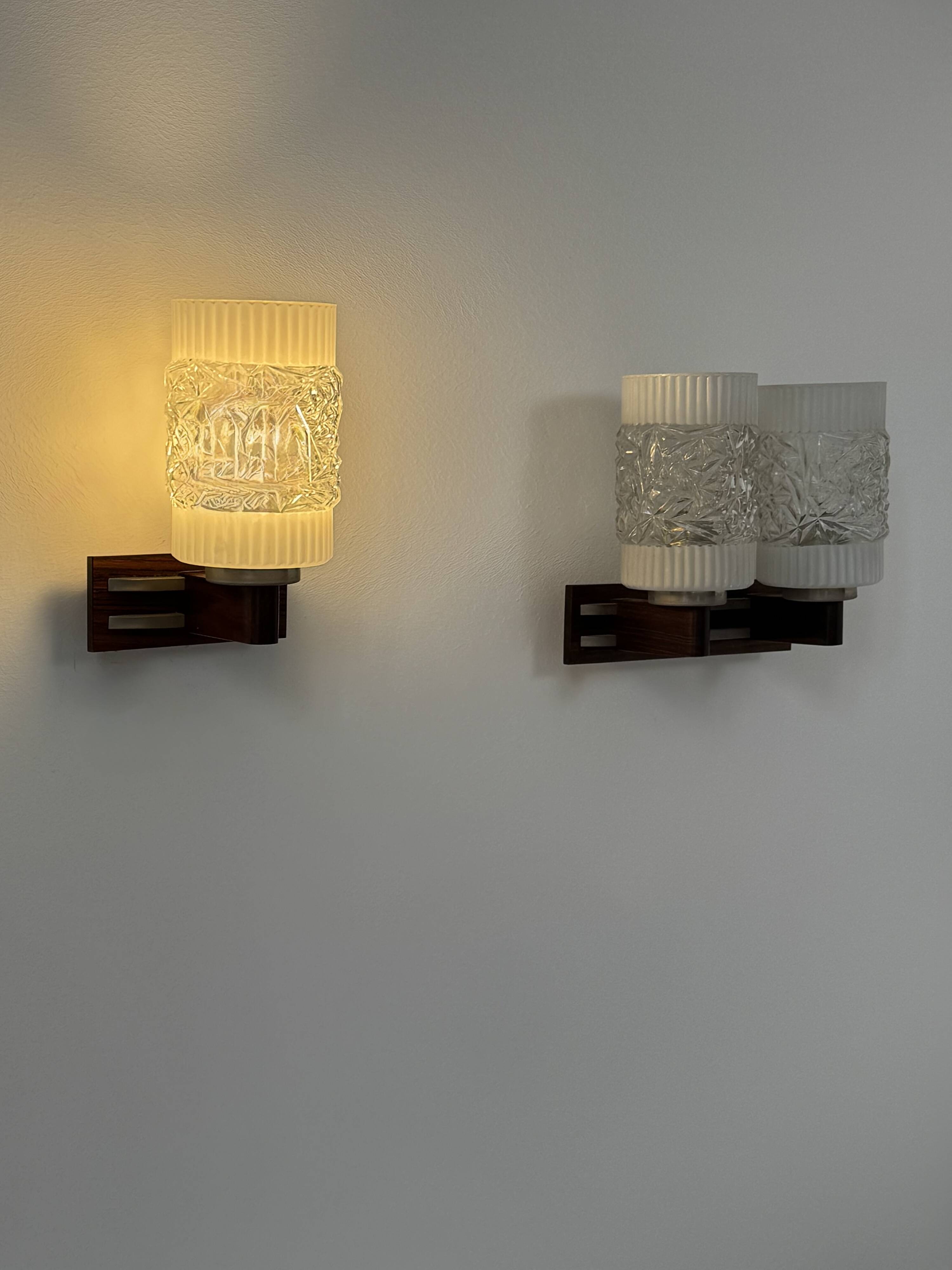 Pair of vintage wall lights, chrome, rosewood and pressed moulded glass, France