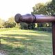 Antique cherry wood farm table with turned base with 2 drawers and 1 pull