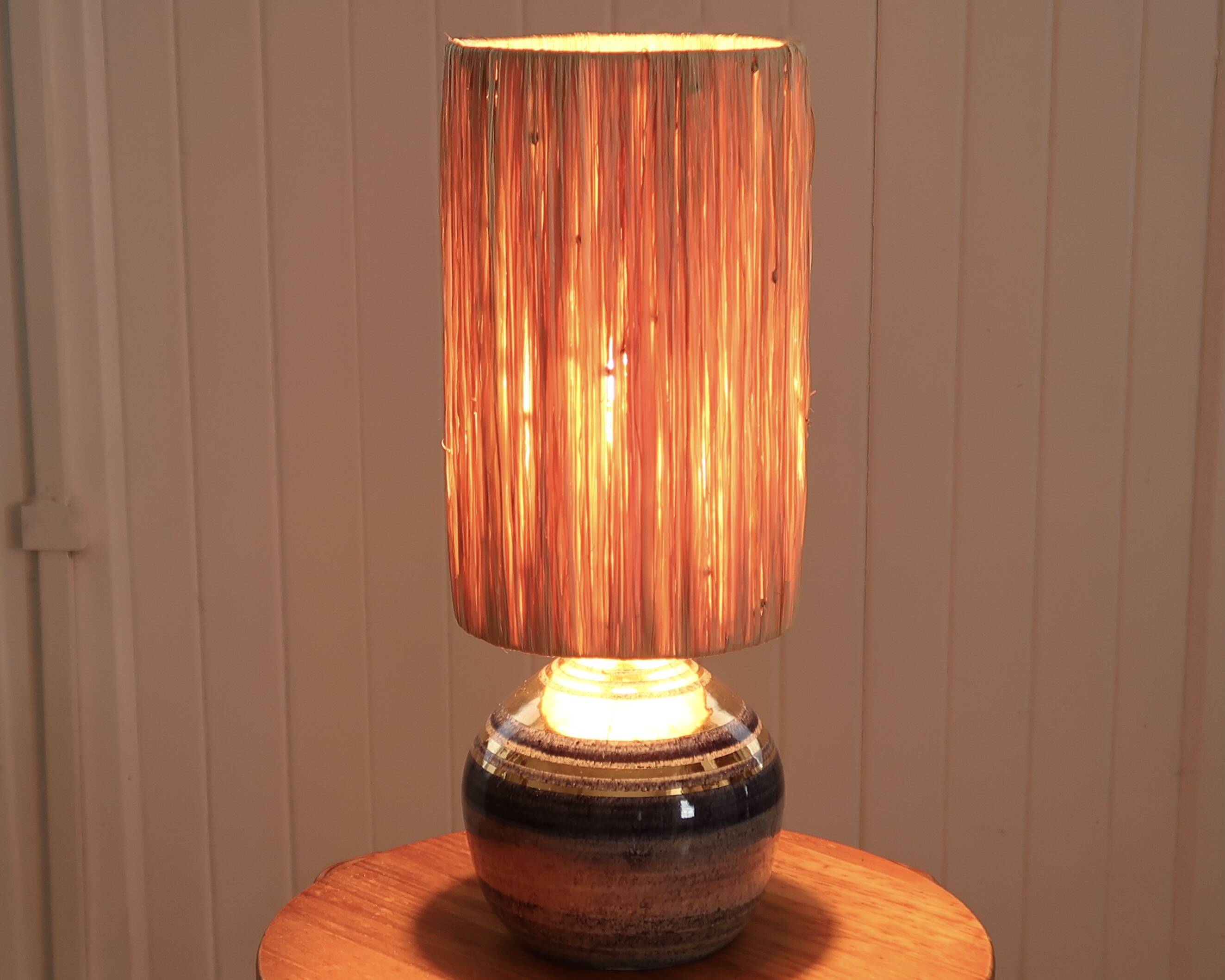 Blue and gold ceramic lamp by Georges Pelletier, raffia lampshade