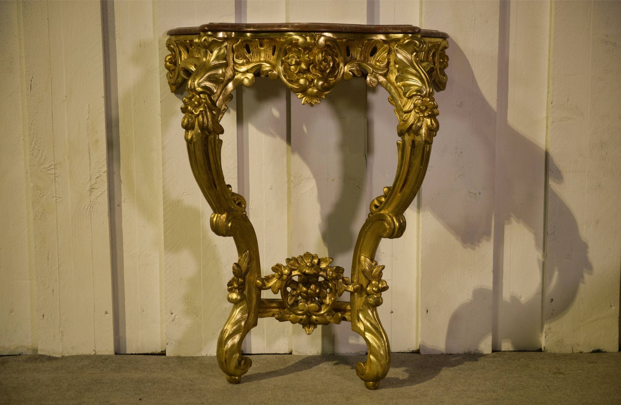 Golden wood and marble console, 19th century.