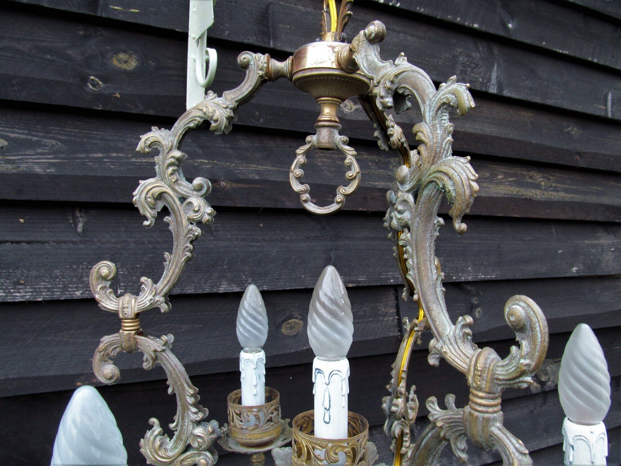 Italian Vintage patinated bronze chandelier with 4 lights with a beautiful wow patina