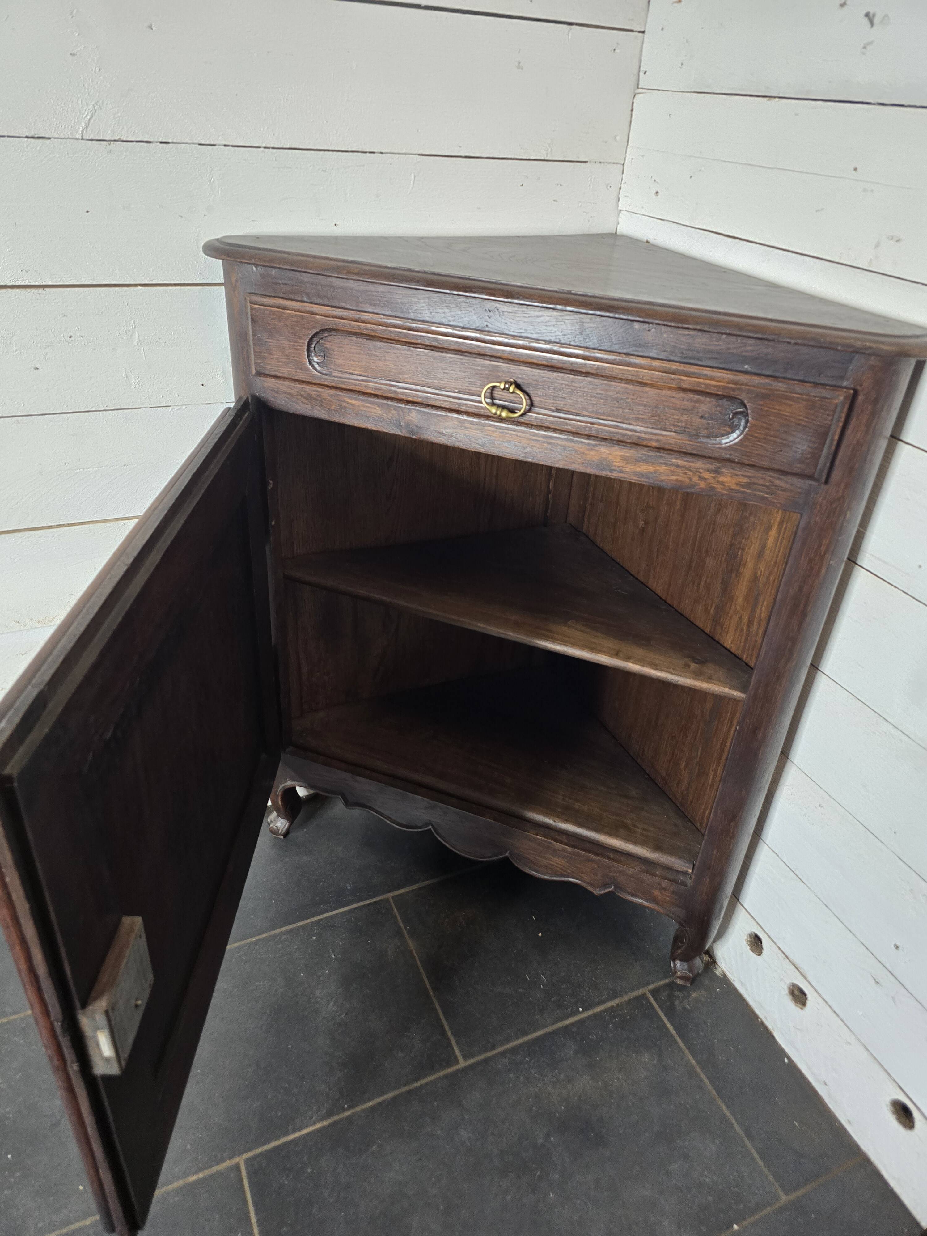 Pair of oak corner cabinets