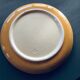 The six Piaf plates in painted terracotta