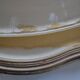 Silver-plated metal aperitif serving tray with HKE hallmark and glass.