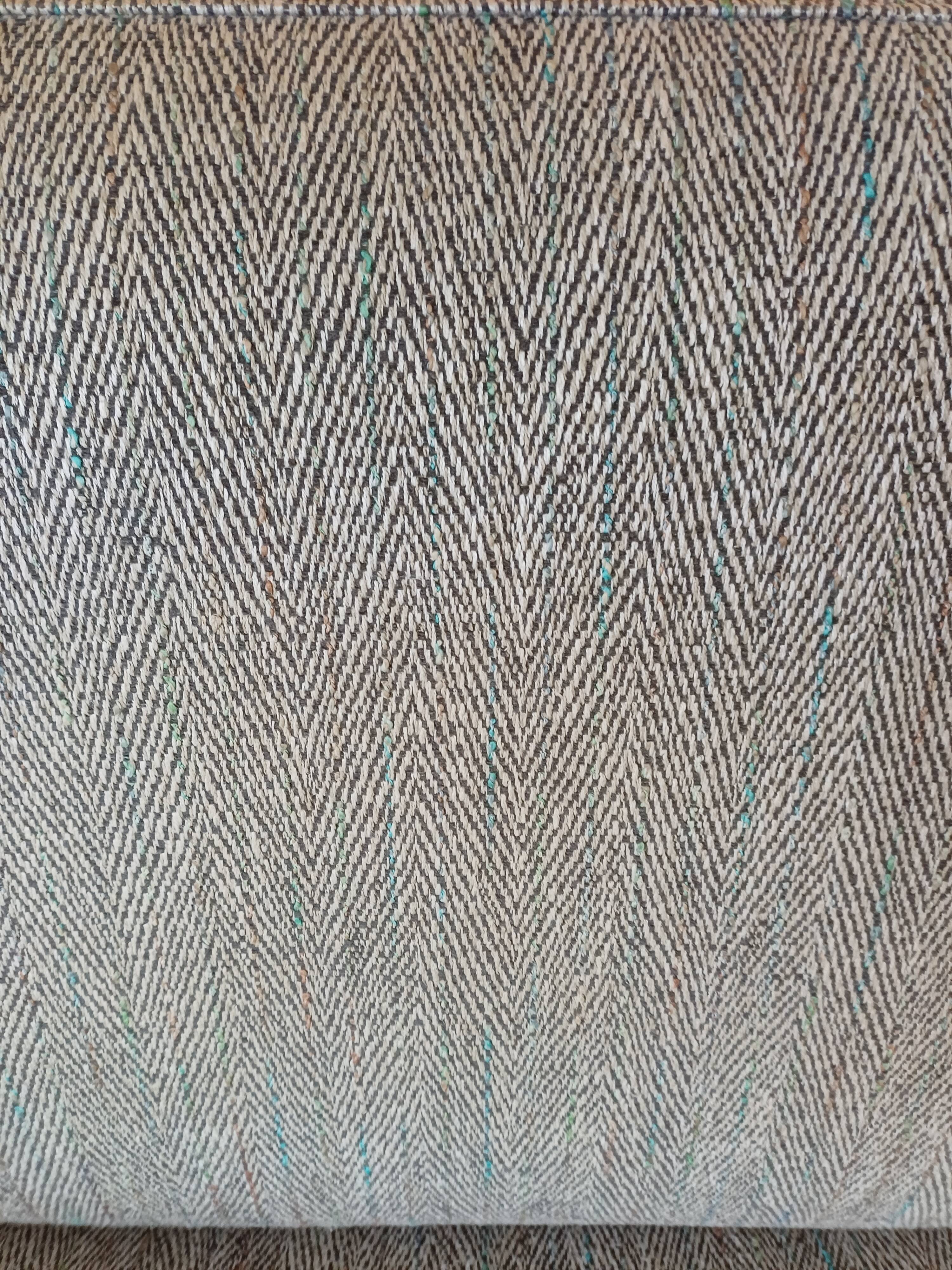 Duvivier canapé 104 Mayenne Alaska pebble fabric and its headrests.