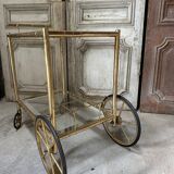 Vintage gold bar cart serving trolley