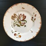 Old plate with floral decoration