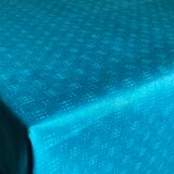 Old damask tablecloth tinted in lagoon blue