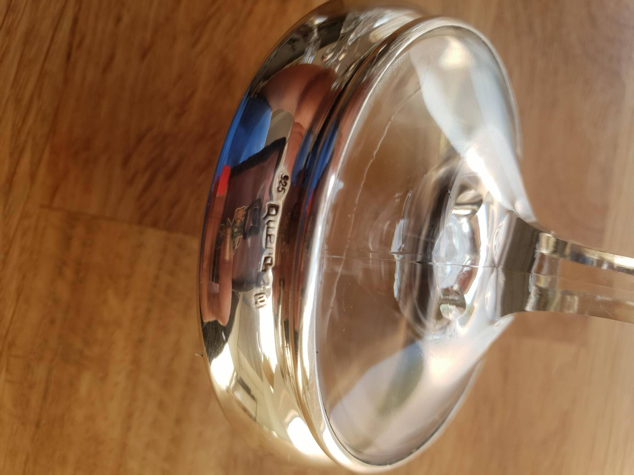Crystal flutes with a silver rimmed foot