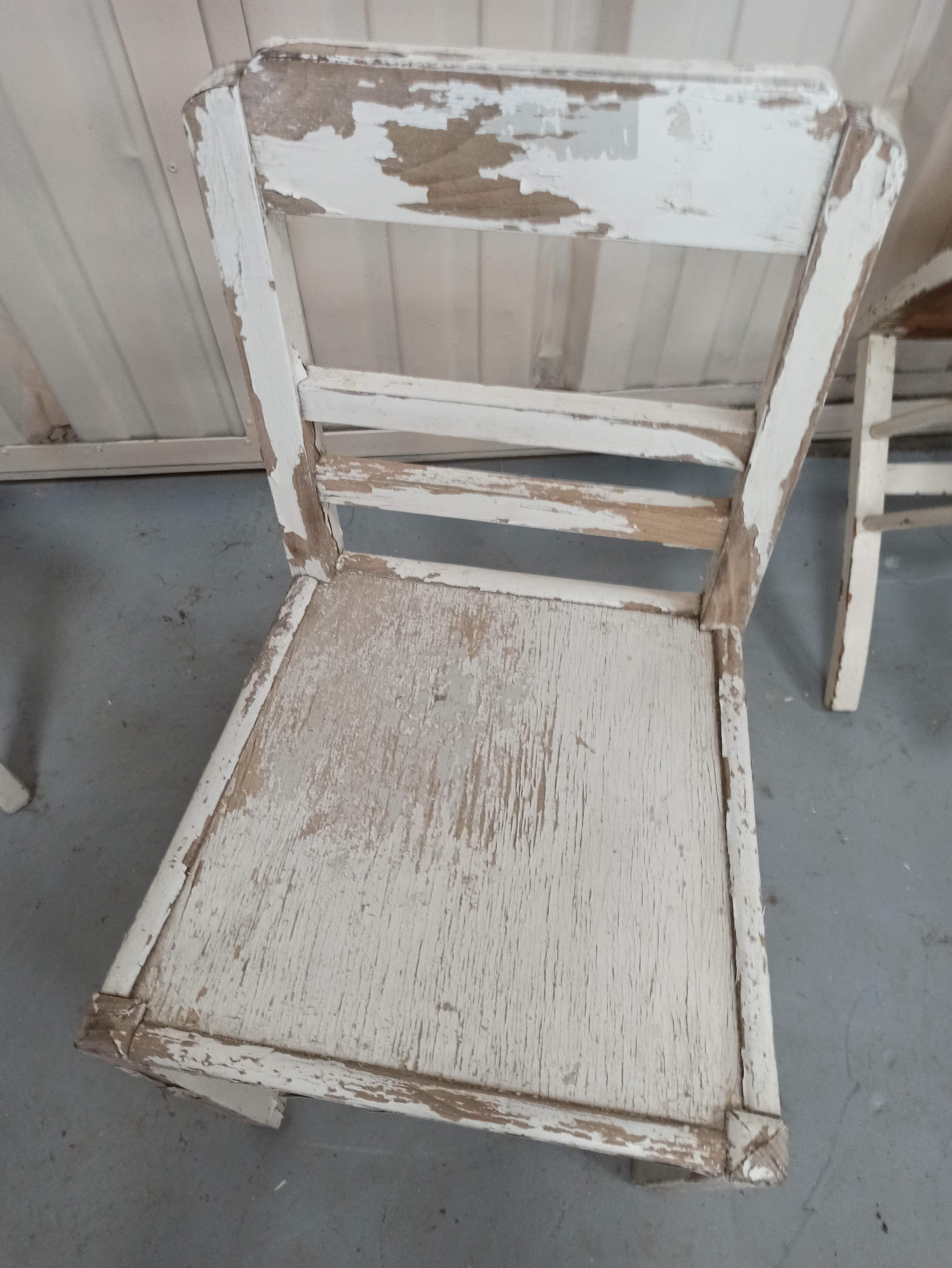 4 patinated white bistro chairs