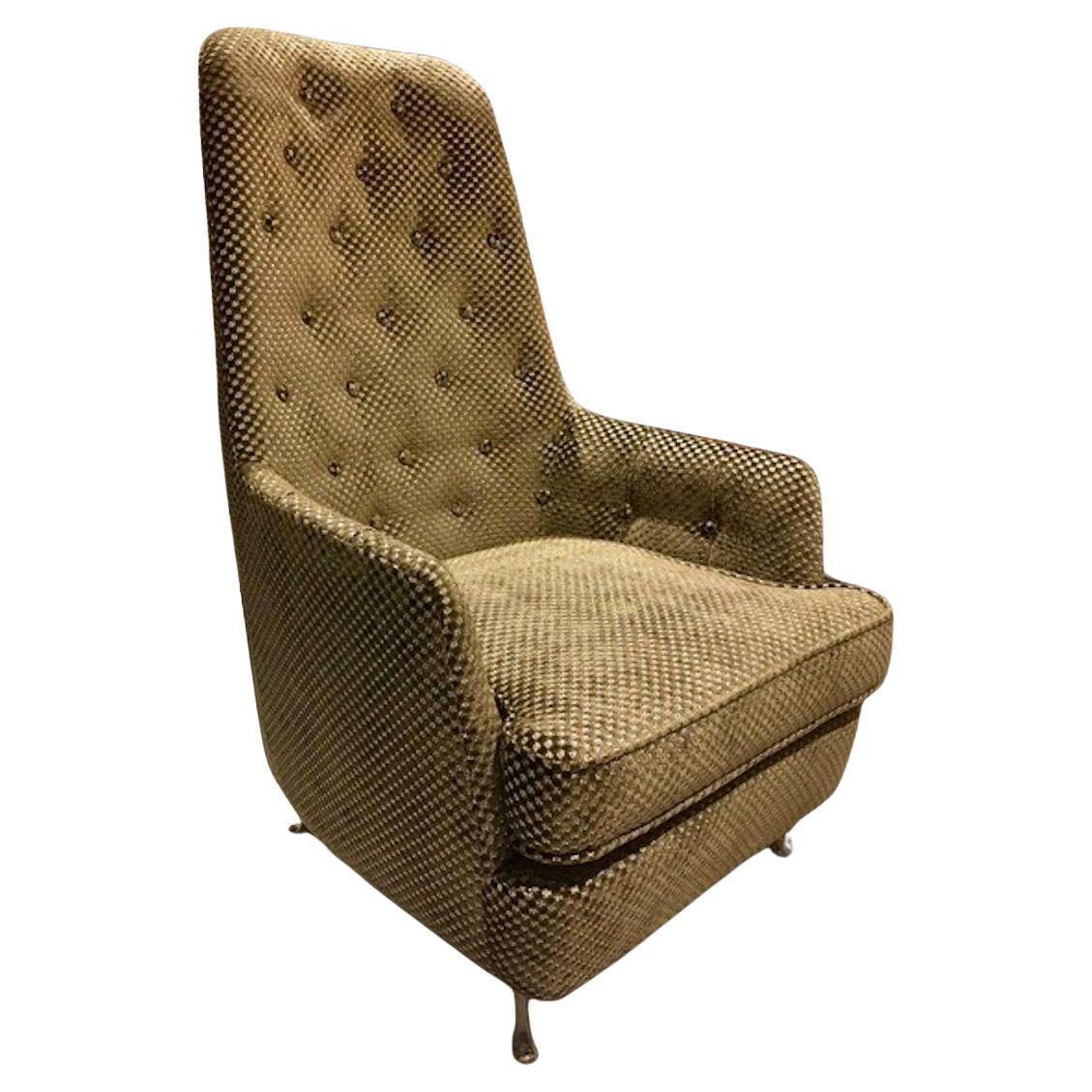 Mid-century buttoned armchair with metal legs