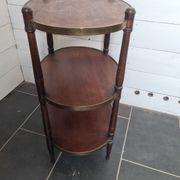 Oval mahogany side table has 3 floors