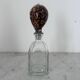 Bouteille avec bouchon coquillage