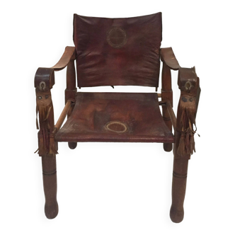 Antique safari armchair in leather