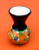 1940s Polychrome ceramic vase decorated with fruit and foliage