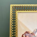 Antique gilt metal frame with flower engraving