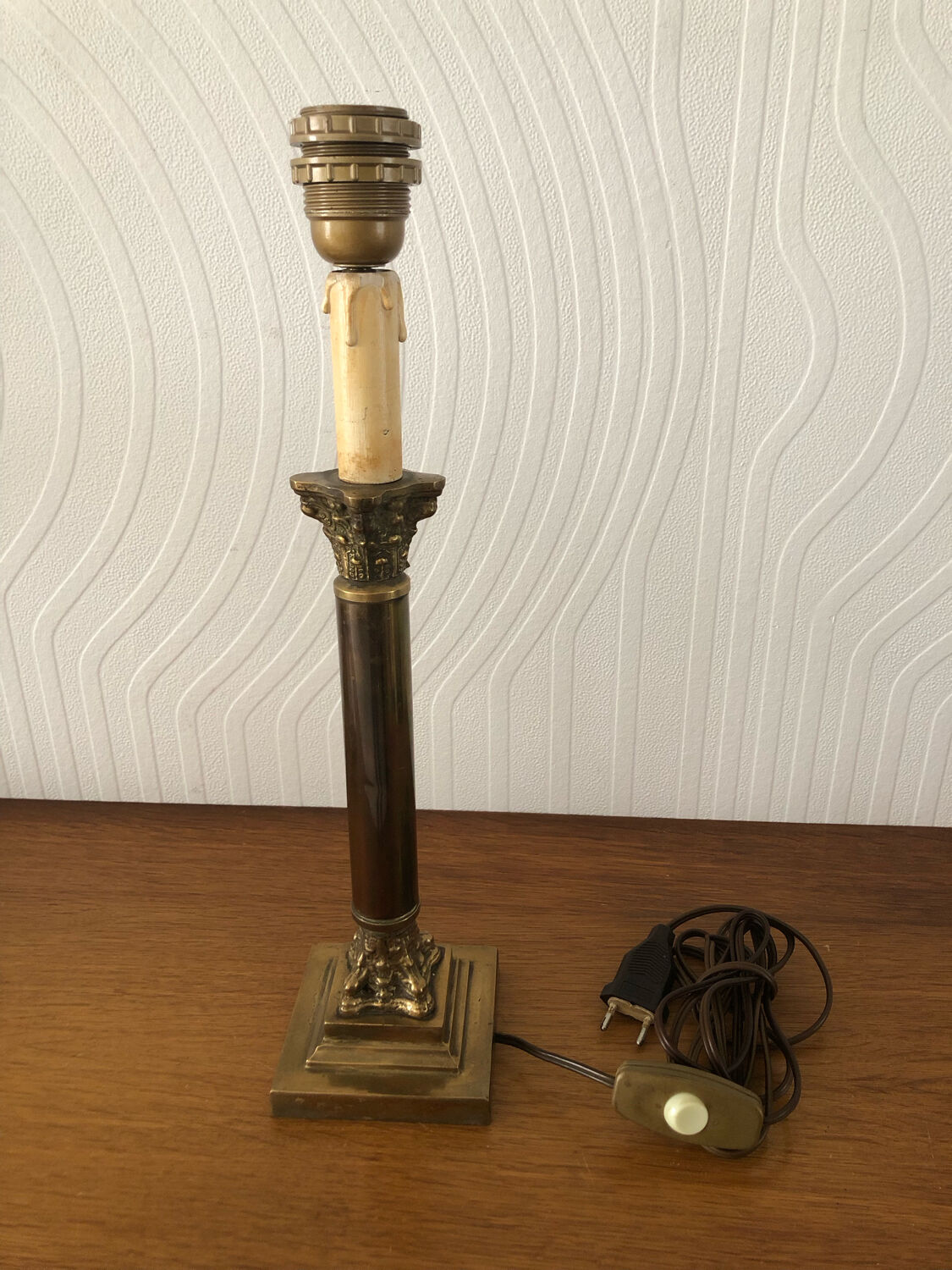 Ancient lamp foot candlestick corinthian column in bronze
