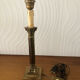 Ancient lamp foot candlestick corinthian column in bronze