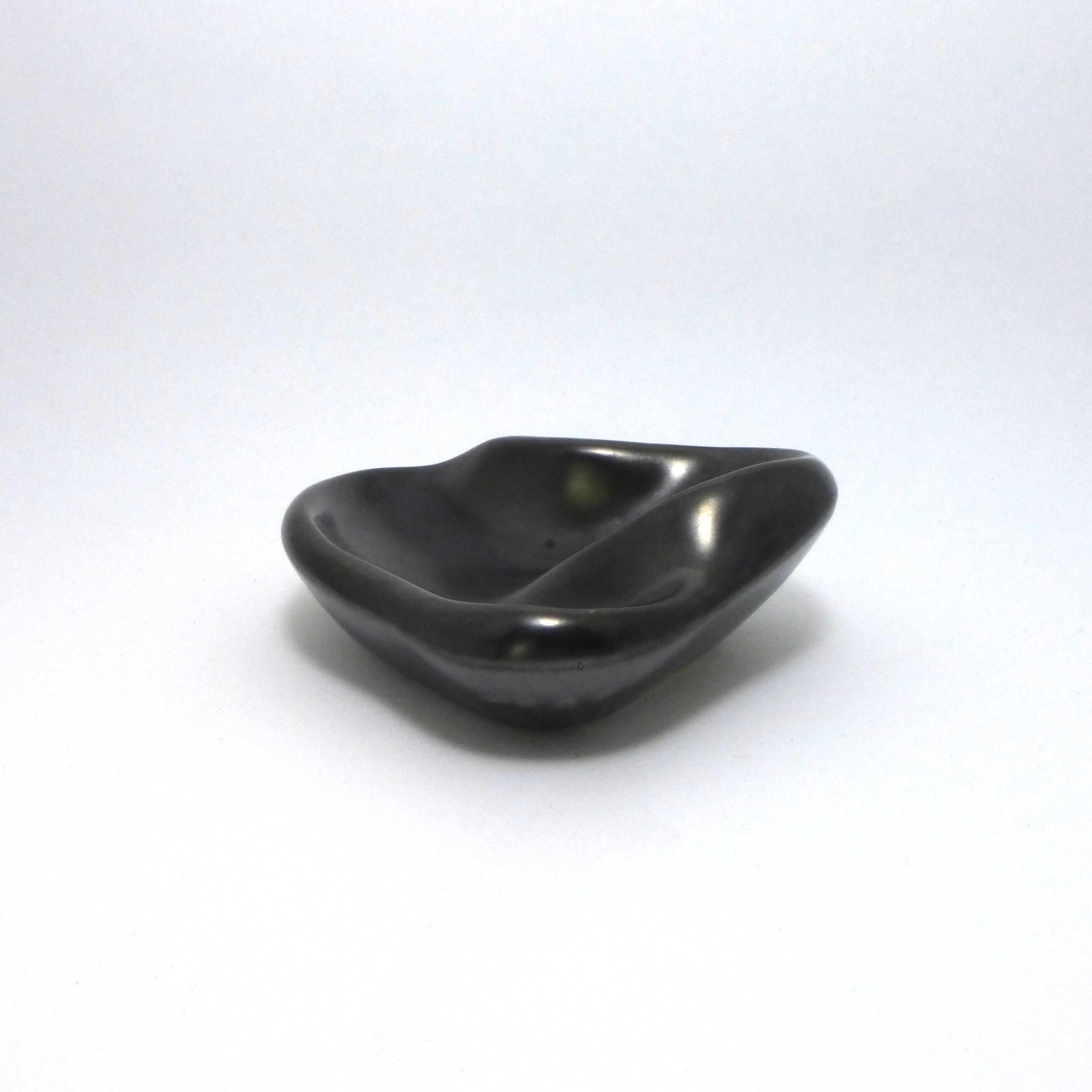 Ashtray in metallic black ceramic around 1950