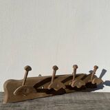 Wooden wall-mounted coat rack