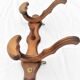 Wooden coats door with hat hanging in the center circa 1930