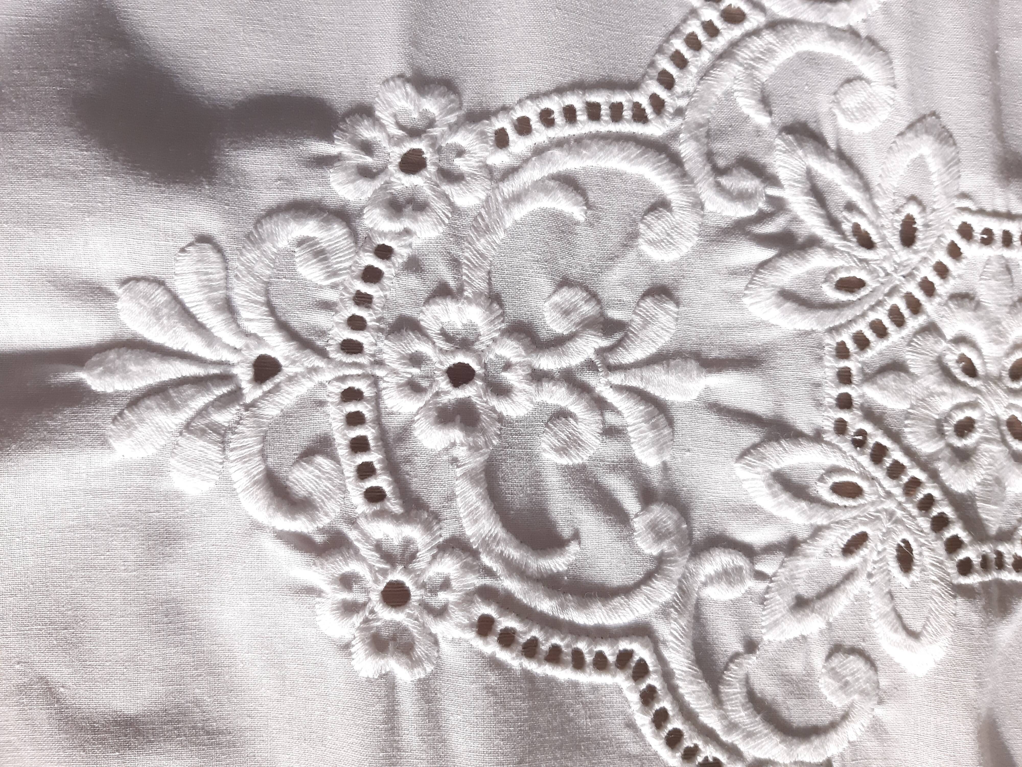Embroidered tablecloth and 12 towels