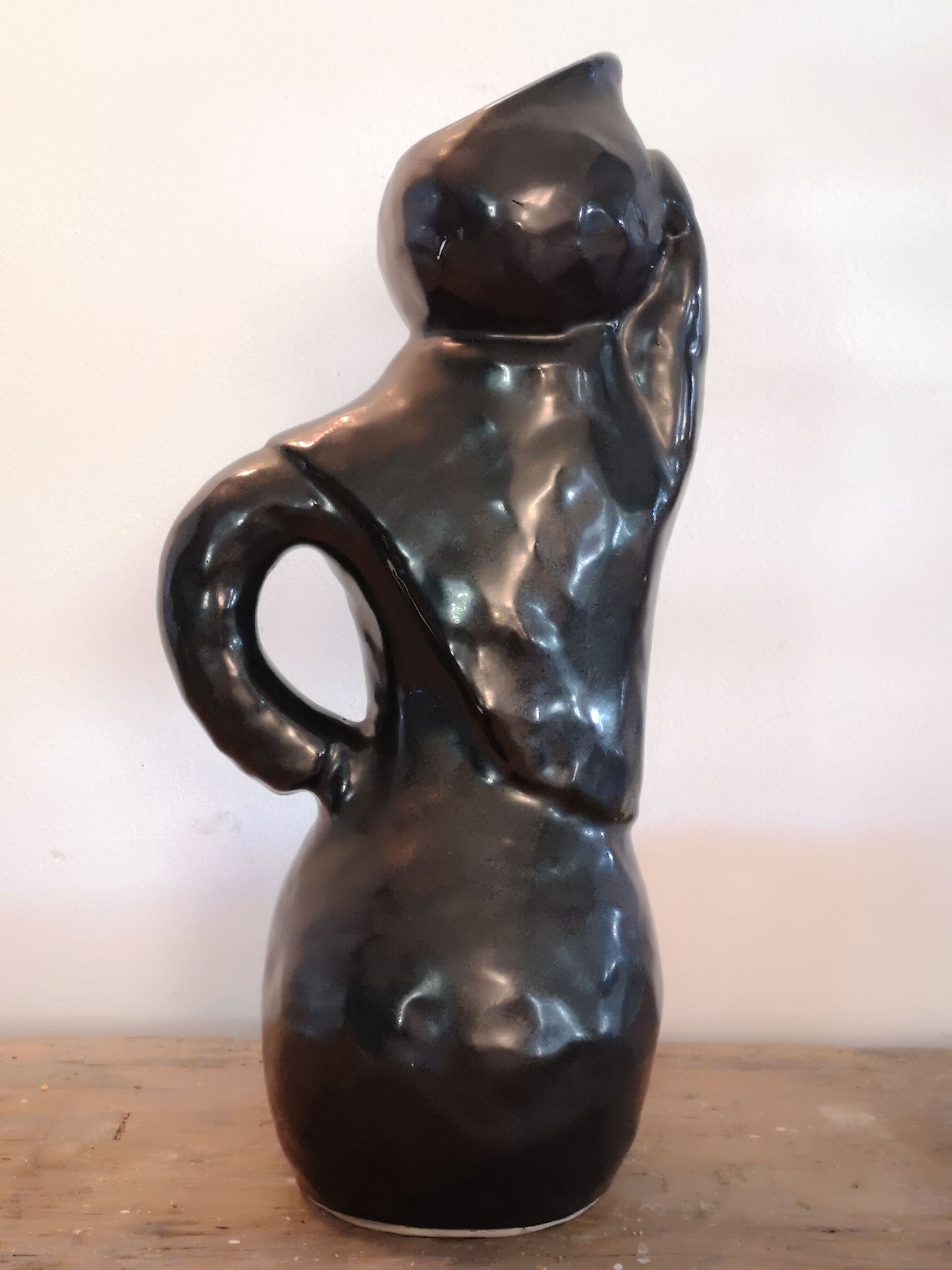 Black enamel ceramic pitcher , signed Raymond camard 1950