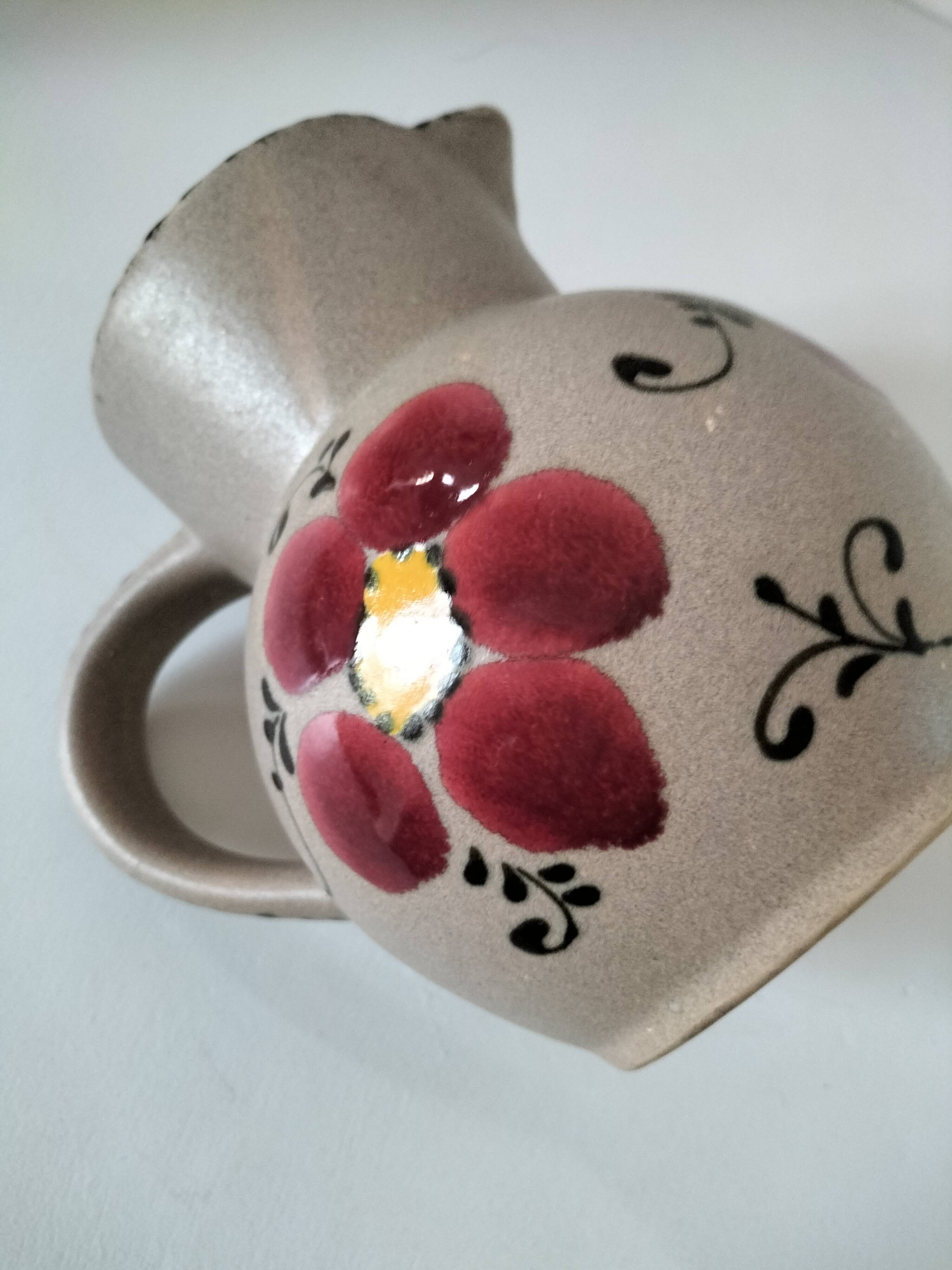 Vintage stoneware pitcher with hand-painted floral decoration, 1960s–70s
